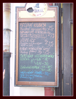 Chalkboard with menu items in Slovak (and some in English) in colored
chalk outside a Bratislava Old Town restaurant