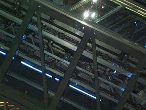 This rather dark photo shows the gears and wheels underneath the Hauptbahnhof escalators
