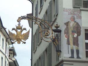 Hanging from the corner of the building is a beautiful double-headed gilt eagle under a crown, and painted on the wall next to the sign is a drawing of Goethe with the legend that he slept here