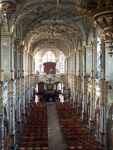 Viewed from a balcony, the royal chapel is a blazing splendor of gilt decorations on columns and ceilings and criss-crossing arches