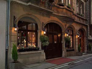 The store is in an elegant stone building, beautifully lit, with expensive wines on display in the arched windows