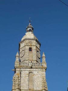 The church tower is octagonal with a stone cupola at the very top
