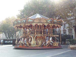 A small but elegant carousel on a square in Avignon