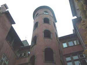 The large window openings, the size of doors, spiralling up around the tower follow the path of the spiral staircase.