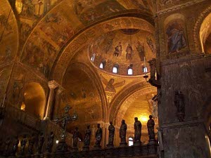 The colors are tans and russets and burnt siena and rich browns and the painted and fresco designs on the roof are most impressive, with figures of saints
