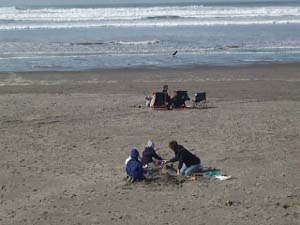 Families playing in the sand, Seaside, Oregon