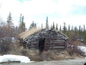 This old wood cabin with a sod roof still stands next to the road and can provide emergency shelter for travelers