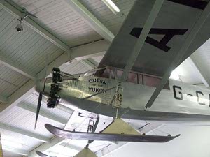 The silver plane has permanently affixed skis for snow operations in the Yukon