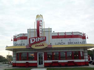 Red and white tiles create an old fashioned image of a striped drive in, entitled Diner inside