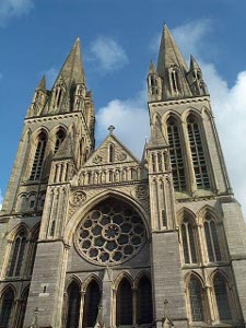 Two large spires flank the central facade with a huge rose window