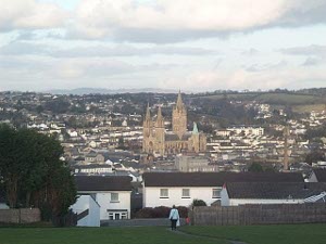 Taken from a hilltop, the view of Truro is dominated by the massive cathedral, surrounded by two- and three-storey buildings