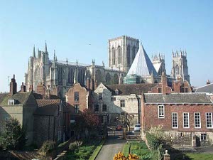 The massive York Minster rises high above surrounding buildings, even churches