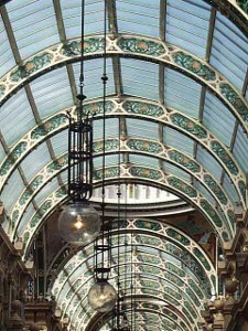 Glass, metal and blue and gold colored decorations set off a brilliant arcade in downtown Leeds