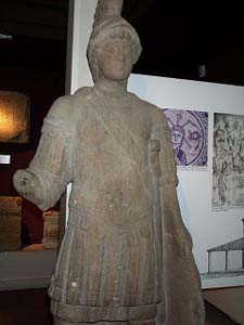 A stone statue of a Roman legionnaire on display in the York Museum