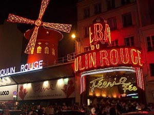 With a signature red windmill brightly illuminated at night, the Moulin Rouge continues to attract tourists