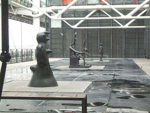 The terrace at Centre Pompidou has large bronze sculptures, widely spaced.