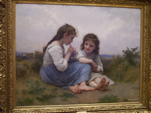 Two barefoot sandy-haired girls, in white blouses and blue skirts, about 12 and 14, seated on a dune