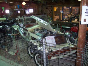 In a crowded and cluttered display room sits the Octo-Rod, an eight-wheeled hot rod concept car that did not capture the public's imagination