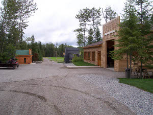 The newly constructed Heritage Village looks very attractive, with fresh pine buildings and green roofs and gravel streets