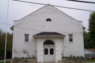 The brick building, now painted white, which was once the Evangelical Lutheran Church, is now the Bunker Hill Masonic Temple