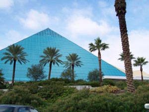 The roof of the Galveston Aquarium is a bright blue pyramid of glass