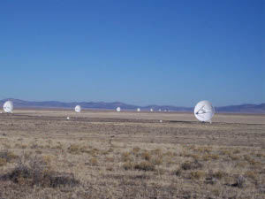 The line of antennas is a row of white dots diminishing to nothing in the distance