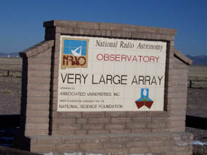 The sign reads 'National Radio Astronomy Observatory - Very Large Array.  It is operated by Associated Universities, Inc., and funded by the National Science Foundation