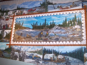 The Labrador Interpretation Center in Northwest River shows native art depicting hunting and living in the wilderness, traveling by boat, sled, plane and truck.