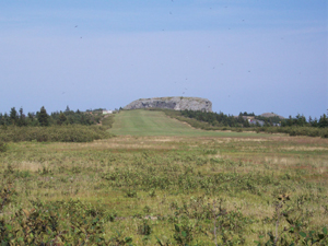The short, inclined, grassy airfield near Harbour Grace, Newfoundland,
used by Amelia Earhart on the first transatlantic flight by a woman.