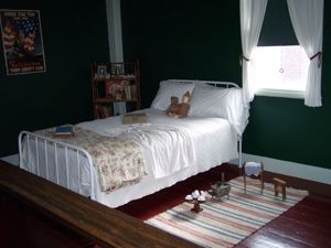 Old toys are shown in a child's bedroom