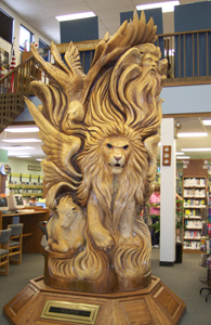 Sculpture Seraphim in Sterling Public Library.  This large vertical wooden sculpture
is almost ten feet tall, and finely carved all around.