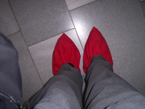 Brightly colored booties were put on over shoes at the Archive