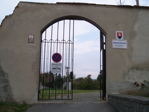 The entrance to the Presov State Archive through a gate to an old monastery