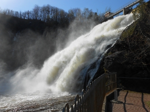 Dropping from right to left, the river falls some 50 feet producing a huge volume of white water and spray