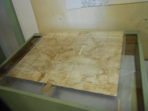 The preserved water-stained map is ready to be inserted into its display case