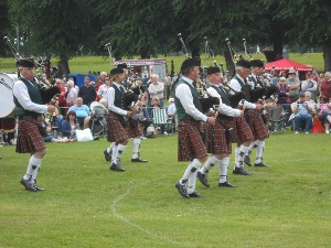 A pipe band marching