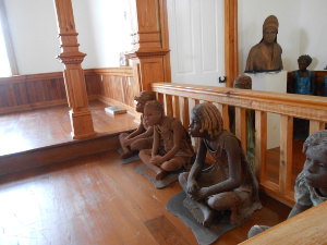 carved terra cotta sculptures of slave children