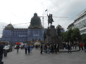 The large statue of Wenceslas at one end of the square with the National Museum undergoing renovation and surrounded with scaffolding in the background.