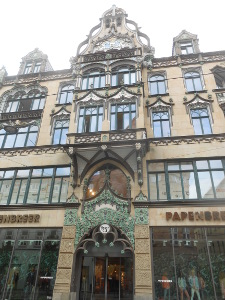 Located in the Anger square, this ornately decorated five story building has curlicues around the windows and an impressive oriel window above the front door, with art nouveau curlicues