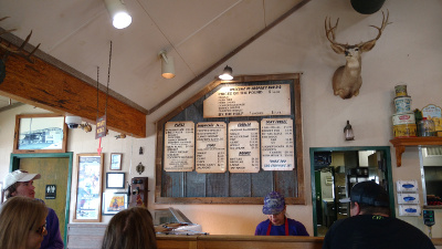 Menu on the wall showing the basic items in a Texas barbecue